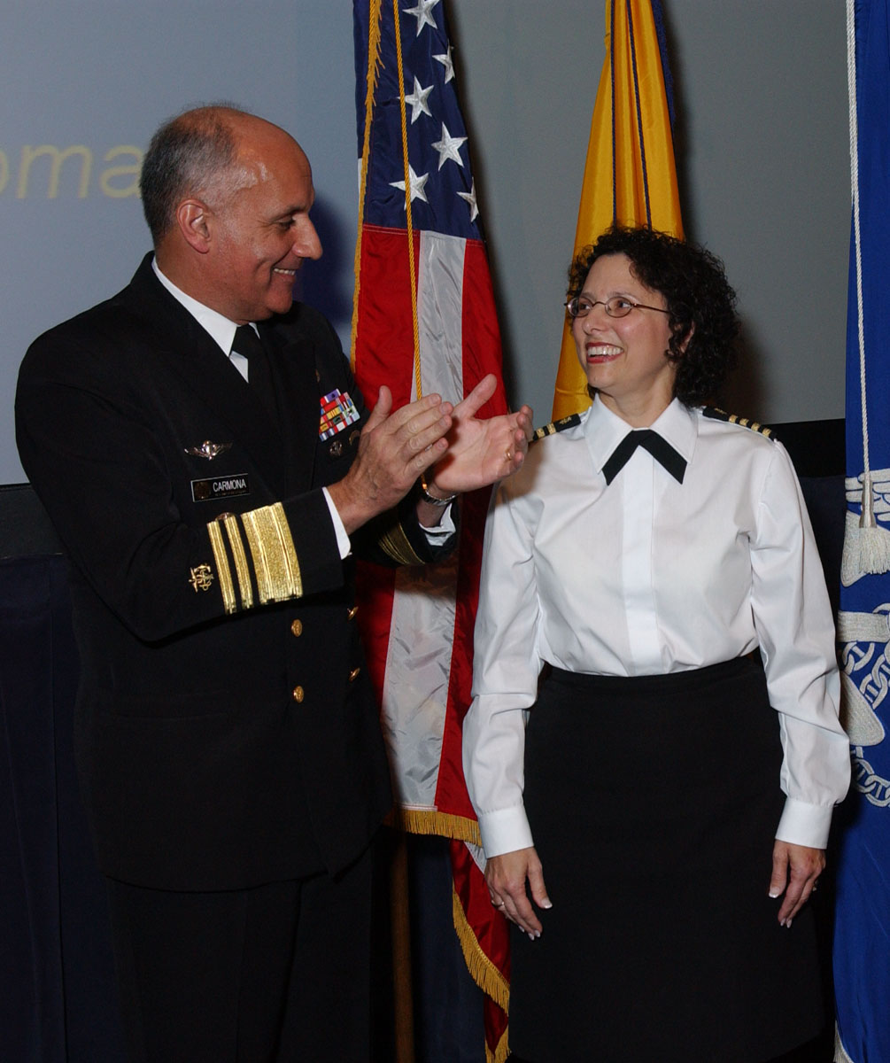 Carol Romano (right) with Surgeon General Richard H. Carmona at her formal promotion ceremony on Dec. 2.