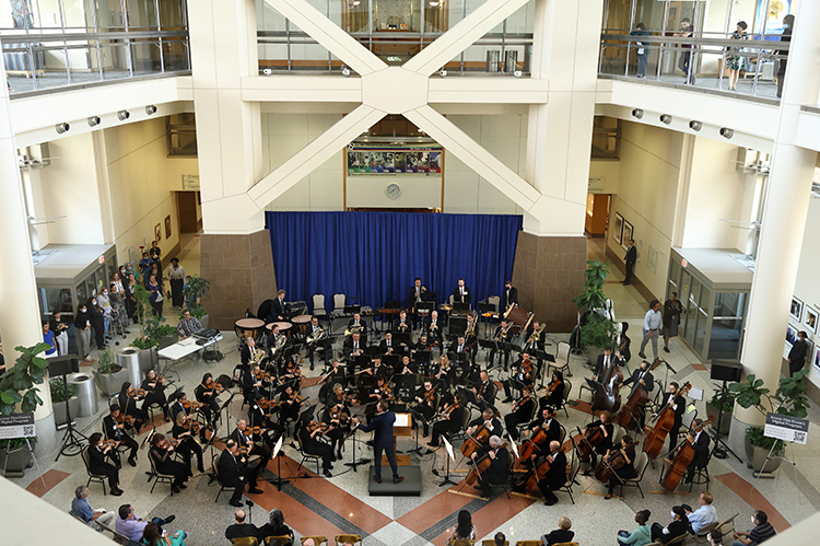 The National Symphony Orchestra Chamber Strings performing in the CC Atrium