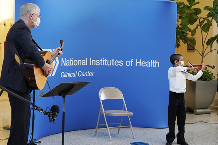 Thanksgiving-week concert featured 13-year old Caesar Santos on violin, NIH Director Dr. Francis Collins on guitar