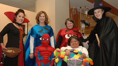 Patients in costumes trick-or-treating