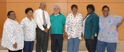 Some of the twelve retiring Housekeeping and Fabric Care employees.