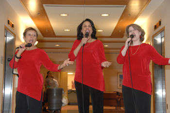 The Inspiration Singers sing in the CC atrium. 