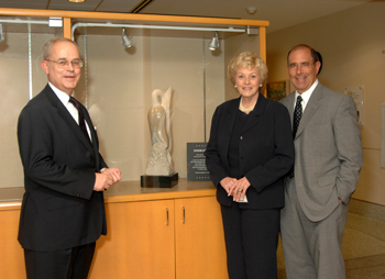 NSABP representatives stand with Dr. Gallin at the presentation of an art piece to the Clinical Center.