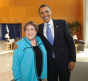 Susan Butler poses with President Obama