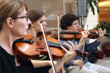 NIH Philharmonia violinists