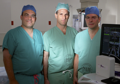 Dr. Peter Pinto (NCI), Dr. Brad Wood (CC) and Dr. Peter Choyk (NCI)