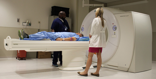 A study participant receiving a scan in the new Photon-Counting CT scanner