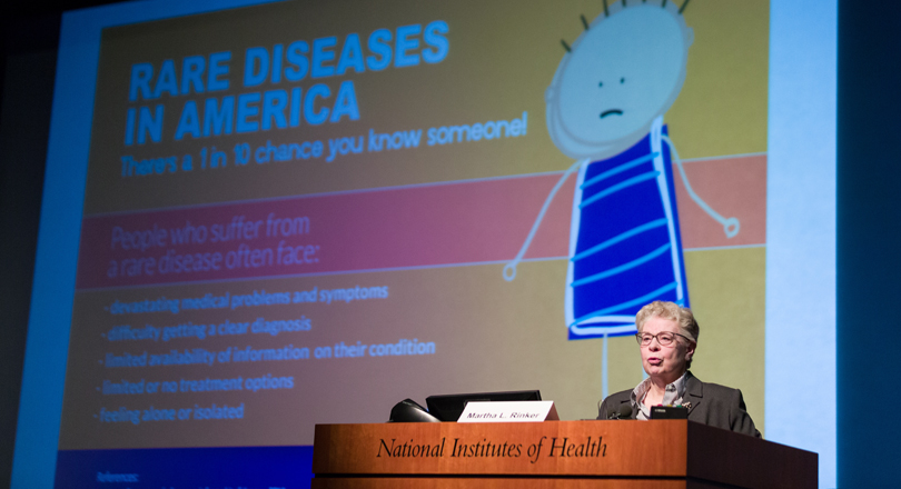 Martha Rinker, speaker from the non-profit National Organization for Rare Disorders (NORD), addresses the audience on Rare Disease Day Feb. 29, 2016, at the NIH Clinical Center.