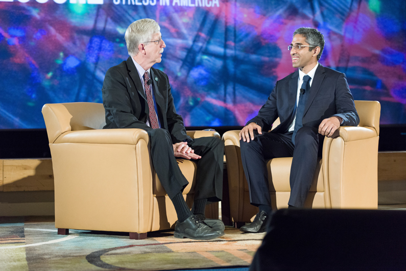 Dr. Francis S. Collins and Dr. Vivek Murthy sit in Masur Auditorium. 