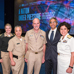 Members of the Public Health Service stand with Dr. Vivek Murthy