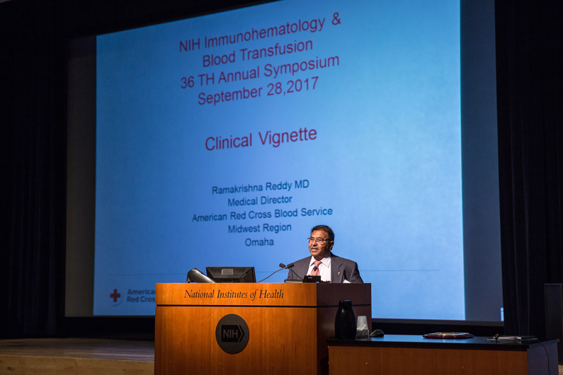 Dr. Ramakrishna Reddy of the American Red Cross Blood Services at a podium