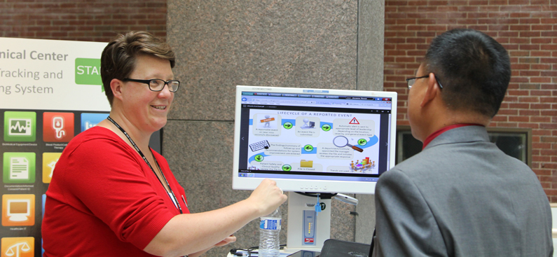 Informational booths were displayed in the FAES terrace during Health IT Day at NIH Clinical Center