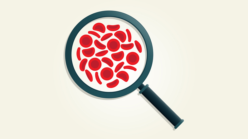 magnifying glass with blood cells in view