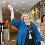 Tricia Coffey, chief of the Health Information Management department participated as torchbearers