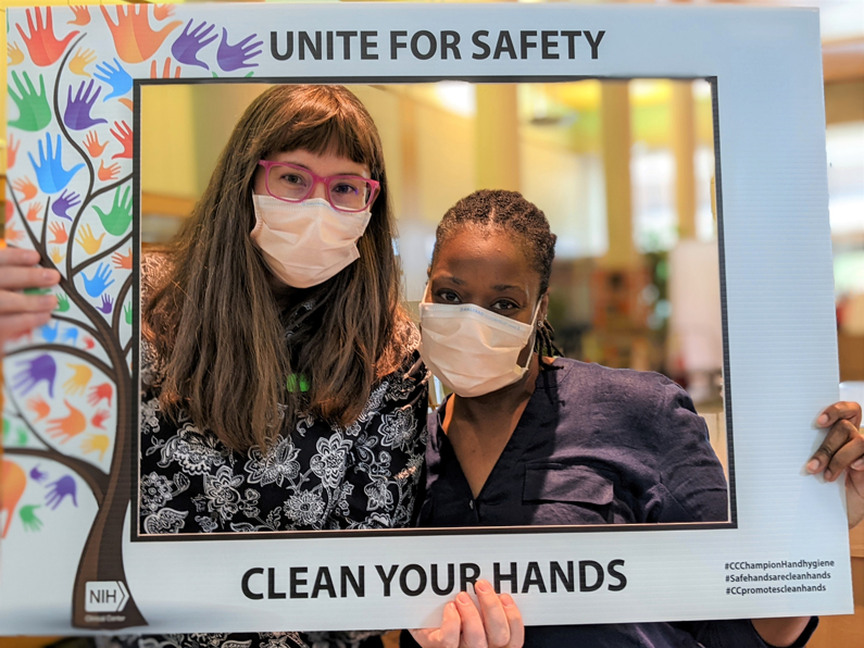 Hospital staff pose for hand hygiene photo