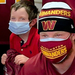 Pediatric patient meets NFL players
