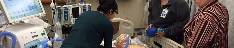 Fellows, nurses and respiratory therapists practice simulated critical care procedures