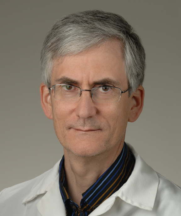 Portrait of Dr. Andrew Mannes
