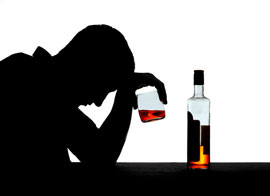 A sad man drinking alcohol