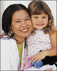 Female doctor with young girl.